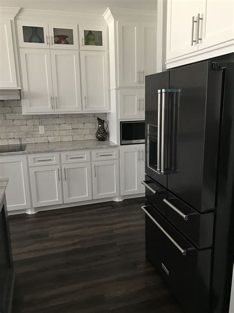 white cabinets black countertops stainless steel appliances|white top cabinets black bottom.